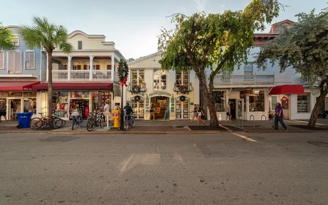 Charming shopfronts and bicycles on Duval Street, Key West, Florida, USA.