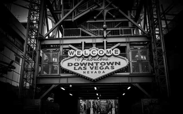 Iconic 'Welcome to Fabulous Downtown Las Vegas' sign in black and white.
