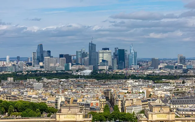 Aerial view of La Défense skyline in Paris with urban architecture and cityscape.