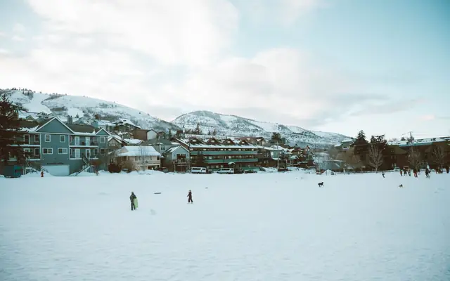 A scenic winter view in Park City with snow-covered landscapes and mountains.