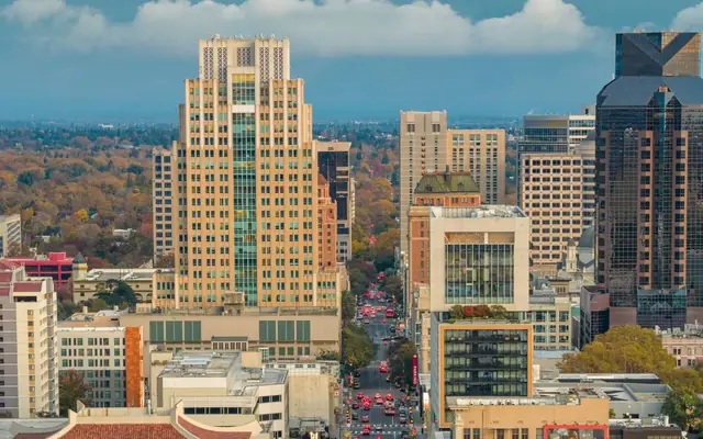 Explore the vibrant skyline of downtown Sacramento with its iconic skyscrapers and bustling streets.
